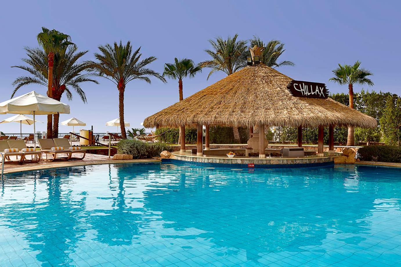 Safir Sharm Waterfalls Resort Exteriér fotografie The pool at the Hilton Sharm El Sheikh